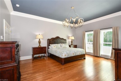 Welcome to this stunning, custom built, all brick home, backing on Grandover Resort in North Carolina - for sale on GolfHomes.com, golf home, golf lot
