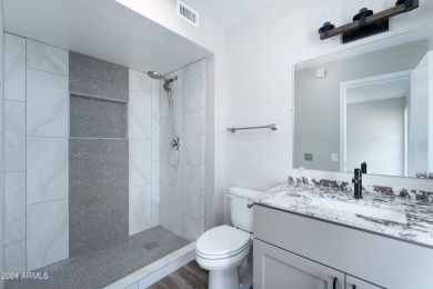Discover this beautifully remodeled Sun City home in a thriving on Sun City Lakes West and East in Arizona - for sale on GolfHomes.com, golf home, golf lot