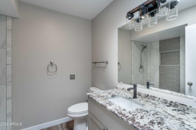 Discover this beautifully remodeled Sun City home in a thriving on Sun City Lakes West and East in Arizona - for sale on GolfHomes.com, golf home, golf lot