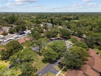 Welcome to 7535 Greystone Drive - a beautifully maintained END on Beacon Woods Golf Club in Florida - for sale on GolfHomes.com, golf home, golf lot