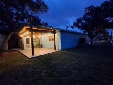 Coastal Cottage Charm: Well-Maintained 2-Bed, 2-Bath with Bonus on Rockport Country Club in Texas - for sale on GolfHomes.com, golf home, golf lot