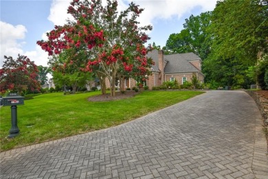 Welcome to this stunning, custom built, all brick home, backing on Grandover Resort in North Carolina - for sale on GolfHomes.com, golf home, golf lot