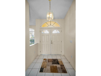 IN TIMBER GREENS A 55+ GATED GOLF COMMUNITY, THIS HOME IS on Timber Greens Country Club in Florida - for sale on GolfHomes.com, golf home, golf lot