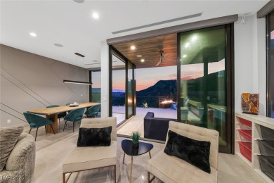 STUNNING STRIP, MOUNTAIN AND CITY VIEWS IN THIS RARE SOUGHT on Dragon Ridge Country Club in Nevada - for sale on GolfHomes.com, golf home, golf lot