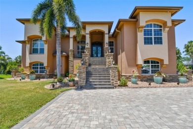 This magnificent four bedroom, three bath pool home is located on Pasadena Yacht and Country Club in Florida - for sale on GolfHomes.com, golf home, golf lot