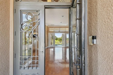This magnificent four bedroom, three bath pool home is located on Pasadena Yacht and Country Club in Florida - for sale on GolfHomes.com, golf home, golf lot
