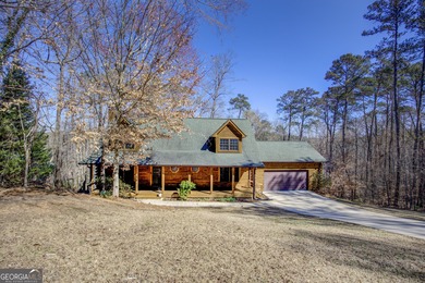 Beautiful and well maintained ready to move in Southland Log on Turtle Cove Golf Course in Georgia - for sale on GolfHomes.com, golf home, golf lot