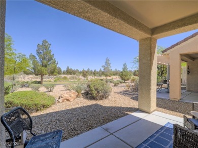 From the moment you enter the gated courtyard, you're greeted on Aliante Golf Club in Nevada - for sale on GolfHomes.com, golf home, golf lot