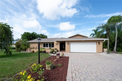 Updated pool home with a fresh new look located within the on Whiskey Creek Country Club in Florida - for sale on GolfHomes.com, golf home, golf lot