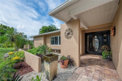 Updated pool home with a fresh new look located within the on Whiskey Creek Country Club in Florida - for sale on GolfHomes.com, golf home, golf lot