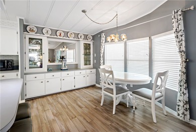 Adorable 2 bed, 2 bath home on a desirable corner lot in on Barefoot Bay Golf Course in Florida - for sale on GolfHomes.com, golf home, golf lot