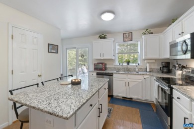 Spacious 3 bedroom colonial is filled with special features and on Lake Monticello Golf Course in Virginia - for sale on GolfHomes.com, golf home, golf lot