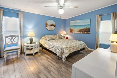 Adorable 2 bed, 2 bath home on a desirable corner lot in on Barefoot Bay Golf Course in Florida - for sale on GolfHomes.com, golf home, golf lot