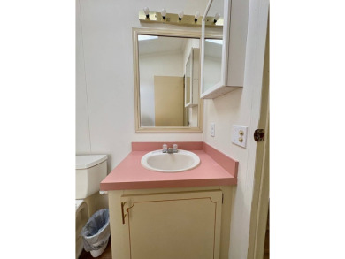 Welcome to 616 Max Rd., a cheerful 1990 Palm Harbor home located on Pelican Pointe Golf and Country Club in Florida - for sale on GolfHomes.com, golf home, golf lot