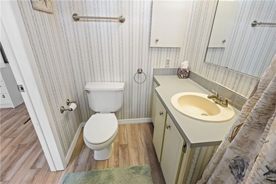 Adorable 2 bed, 2 bath home on a desirable corner lot in on Barefoot Bay Golf Course in Florida - for sale on GolfHomes.com, golf home, golf lot