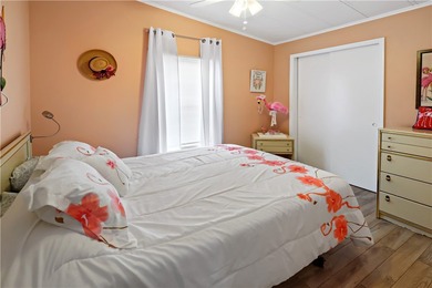 Adorable 2 bed, 2 bath home on a desirable corner lot in on Barefoot Bay Golf Course in Florida - for sale on GolfHomes.com, golf home, golf lot