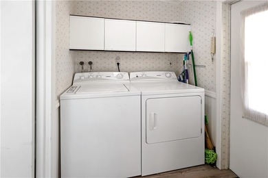 Adorable 2 bed, 2 bath home on a desirable corner lot in on Barefoot Bay Golf Course in Florida - for sale on GolfHomes.com, golf home, golf lot