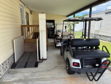 Welcome to 616 Max Rd., a cheerful 1990 Palm Harbor home located on Pelican Pointe Golf and Country Club in Florida - for sale on GolfHomes.com, golf home, golf lot