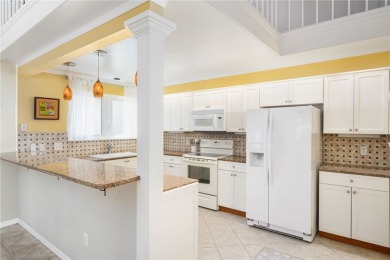 This immaculate 2/2.5 townhome in Grand Harbor comes with a on Grand Harbor Golf and Country Club in Florida - for sale on GolfHomes.com, golf home, golf lot