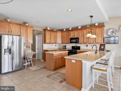 An Exceptional Coastal Retreat - Nestled within the prestigious on Plantation Lakes Golf and Country Club in Delaware - for sale on GolfHomes.com, golf home, golf lot