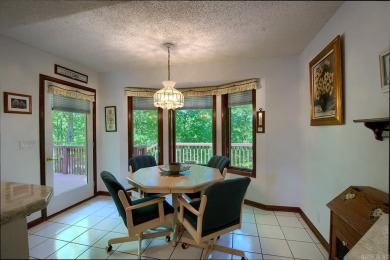 A SERENE RETREAT!  Meticulously landscaped, this tastefully on Cortez Golf Course in Arkansas - for sale on GolfHomes.com, golf home, golf lot
