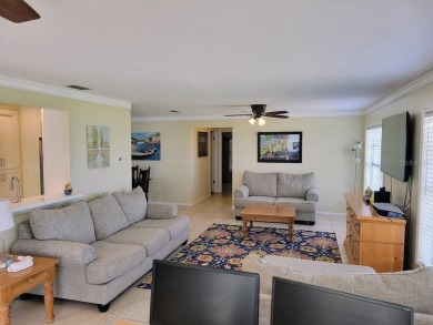Welcome to Mainlands, an active 55+ golf cart-friendly community on Mainlands Golf Club in Florida - for sale on GolfHomes.com, golf home, golf lot
