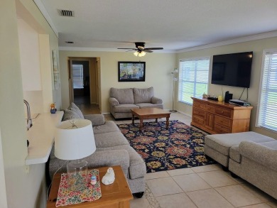 Welcome to Mainlands, an active 55+ golf cart-friendly community on Mainlands Golf Club in Florida - for sale on GolfHomes.com, golf home, golf lot