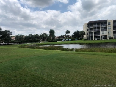 AMAZING VIEWS FROM THIS 2 BEDROOM 2 BATH WHITEHALL CONDO LOCATED on  in Florida - for sale on GolfHomes.com, golf home, golf lot