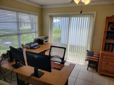Welcome to Mainlands, an active 55+ golf cart-friendly community on Mainlands Golf Club in Florida - for sale on GolfHomes.com, golf home, golf lot