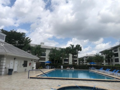 AMAZING VIEWS FROM THIS 2 BEDROOM 2 BATH WHITEHALL CONDO LOCATED on  in Florida - for sale on GolfHomes.com, golf home, golf lot