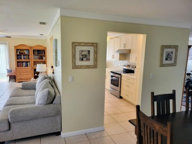 Welcome to Mainlands, an active 55+ golf cart-friendly community on Mainlands Golf Club in Florida - for sale on GolfHomes.com, golf home, golf lot