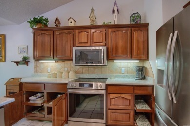 A SERENE RETREAT!  Meticulously landscaped, this tastefully on Cortez Golf Course in Arkansas - for sale on GolfHomes.com, golf home, golf lot