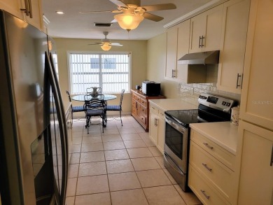 Welcome to Mainlands, an active 55+ golf cart-friendly community on Mainlands Golf Club in Florida - for sale on GolfHomes.com, golf home, golf lot