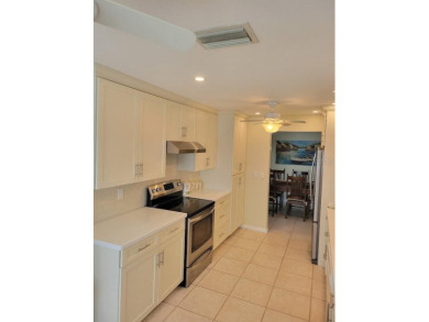 Welcome to Mainlands, an active 55+ golf cart-friendly community on Mainlands Golf Club in Florida - for sale on GolfHomes.com, golf home, golf lot