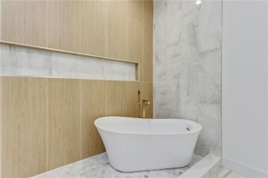 This stunning new construction blends luxury, functionality, and on The Highlands Course at Lake Arrowhead in Georgia - for sale on GolfHomes.com, golf home, golf lot