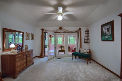 A SERENE RETREAT!  Meticulously landscaped, this tastefully on Cortez Golf Course in Arkansas - for sale on GolfHomes.com, golf home, golf lot