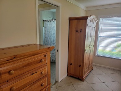 Welcome to Mainlands, an active 55+ golf cart-friendly community on Mainlands Golf Club in Florida - for sale on GolfHomes.com, golf home, golf lot