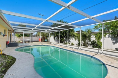 Savor the Florida lifestyle in this charming three-bedroom pool on Daytona Beach Golf Club in Florida - for sale on GolfHomes.com, golf home, golf lot