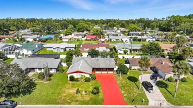 Savor the Florida lifestyle in this charming three-bedroom pool on Daytona Beach Golf Club in Florida - for sale on GolfHomes.com, golf home, golf lot