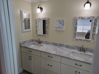Welcome to Mainlands, an active 55+ golf cart-friendly community on Mainlands Golf Club in Florida - for sale on GolfHomes.com, golf home, golf lot