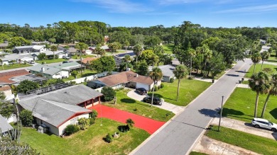 Savor the Florida lifestyle in this charming three-bedroom pool on Daytona Beach Golf Club in Florida - for sale on GolfHomes.com, golf home, golf lot