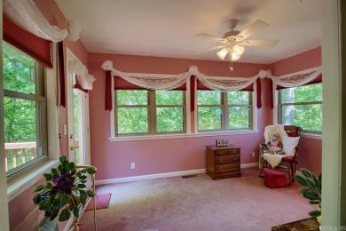 A SERENE RETREAT!  Meticulously landscaped, this tastefully on Cortez Golf Course in Arkansas - for sale on GolfHomes.com, golf home, golf lot