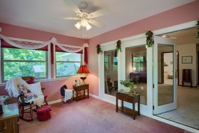 A SERENE RETREAT!  Meticulously landscaped, this tastefully on Cortez Golf Course in Arkansas - for sale on GolfHomes.com, golf home, golf lot
