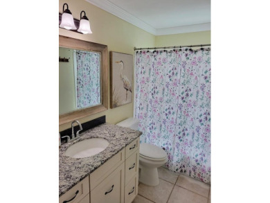 Welcome to Mainlands, an active 55+ golf cart-friendly community on Mainlands Golf Club in Florida - for sale on GolfHomes.com, golf home, golf lot