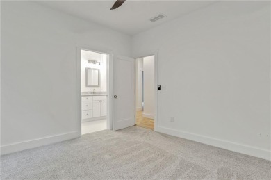 This stunning new construction blends luxury, functionality, and on The Highlands Course at Lake Arrowhead in Georgia - for sale on GolfHomes.com, golf home, golf lot