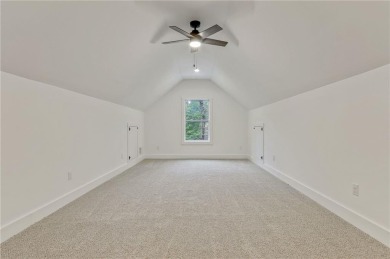 This stunning new construction blends luxury, functionality, and on The Highlands Course at Lake Arrowhead in Georgia - for sale on GolfHomes.com, golf home, golf lot