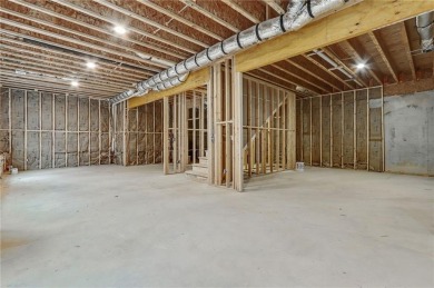 This stunning new construction blends luxury, functionality, and on The Highlands Course at Lake Arrowhead in Georgia - for sale on GolfHomes.com, golf home, golf lot