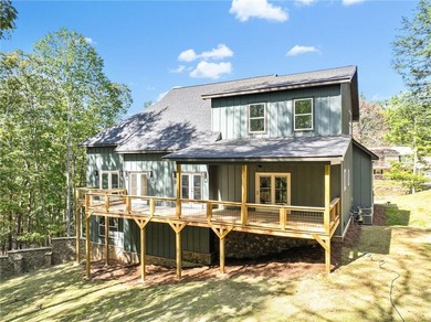 This stunning new construction blends luxury, functionality, and on The Highlands Course at Lake Arrowhead in Georgia - for sale on GolfHomes.com, golf home, golf lot