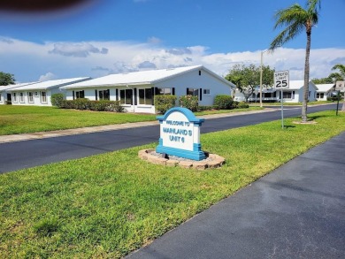 Welcome to Mainlands, an active 55+ golf cart-friendly community on Mainlands Golf Club in Florida - for sale on GolfHomes.com, golf home, golf lot