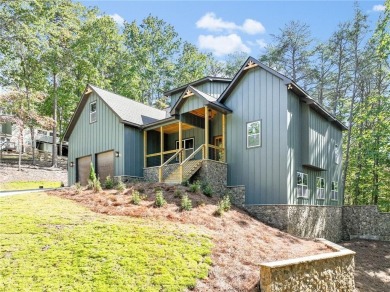 This stunning new construction blends luxury, functionality, and on The Highlands Course at Lake Arrowhead in Georgia - for sale on GolfHomes.com, golf home, golf lot